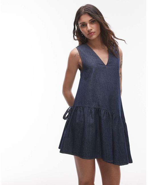 TOPSHOP Blue Denim Mini Dress With Peplum Hem And Bow Detail