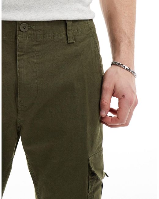 Pantaloni cargo oliva di Tommy Hilfiger in Green da Uomo