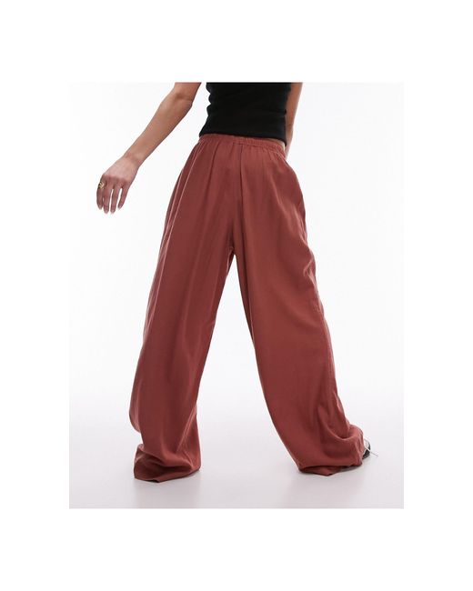 Pantalones color TOPSHOP de color Red