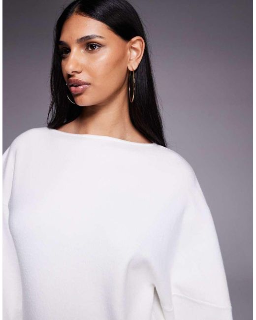 The Frolic White Exclusive Straight Neck Ribbed Knit Balloon Sleeve Mini Jumper Dress