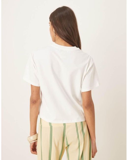 Never Fully Dressed White Embroidered Palm Boob T-shirt