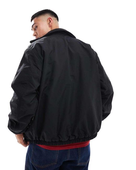 Chaqueta Negra Reversible Con Detalle De Escudo De Tejido Tipo Peluche De Tommy Hilfiger de hombre de color Blue