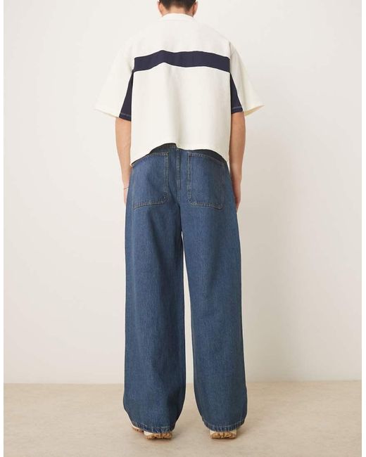 Jeans Larghi Lavaggio Blu Medio Con Cuciture Attorcigliate di ASOS in Blue da Uomo