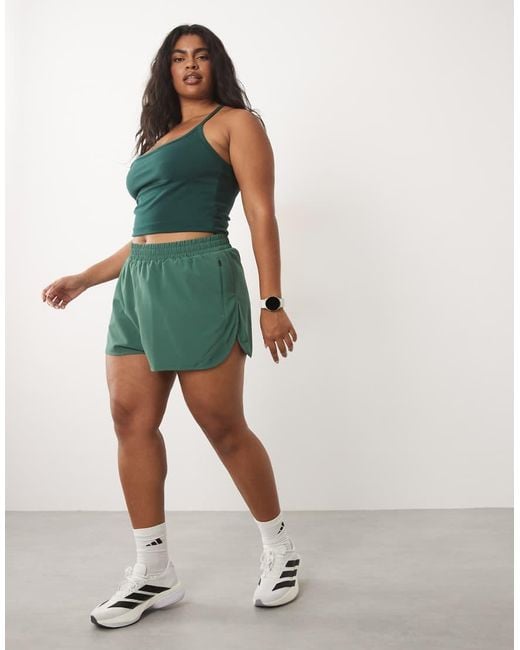 4505 Green Curve Icon Woven Running Shorts With Zip Pockets