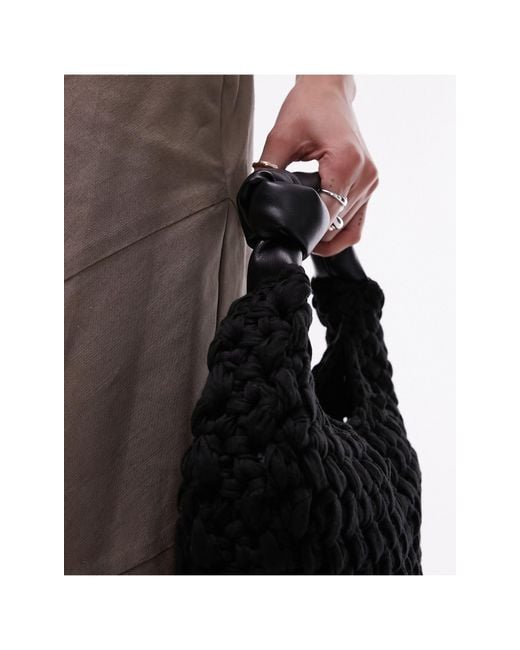 Gretel - borsa nera con manico con nodo e design intrecciato di TOPSHOP in Brown