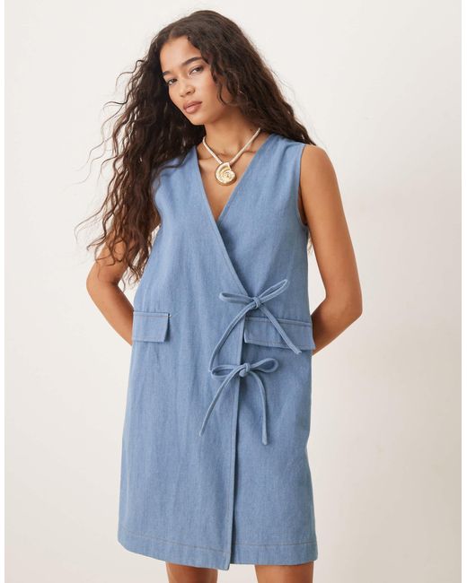 Beckett - robe portefeuille courte en denim Ghospell en coloris Blue
