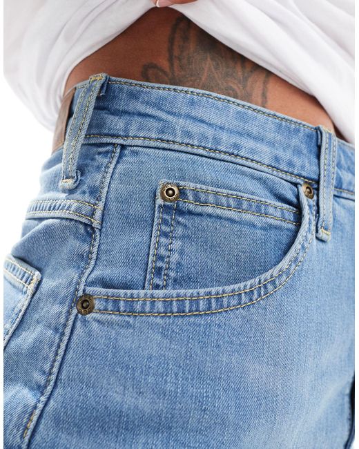 Stella - pantaloncini di jeans a vita alta azzurri di Lee Jeans in Blue