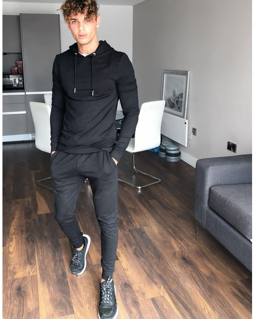 Chándal ajustado con sudadera con capucha en tejido orgánico ASOS de hombre  de color Negro | Lyst