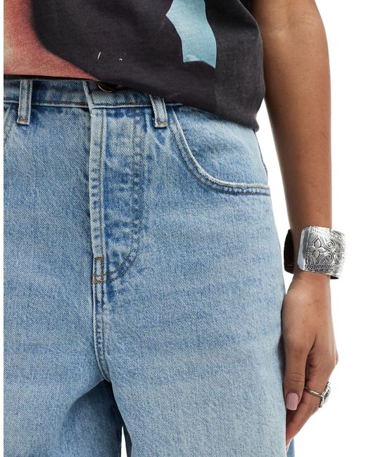 X015 - jeans super baggy a vita bassa lavaggio chiaro con strappi di Collusion in Blue