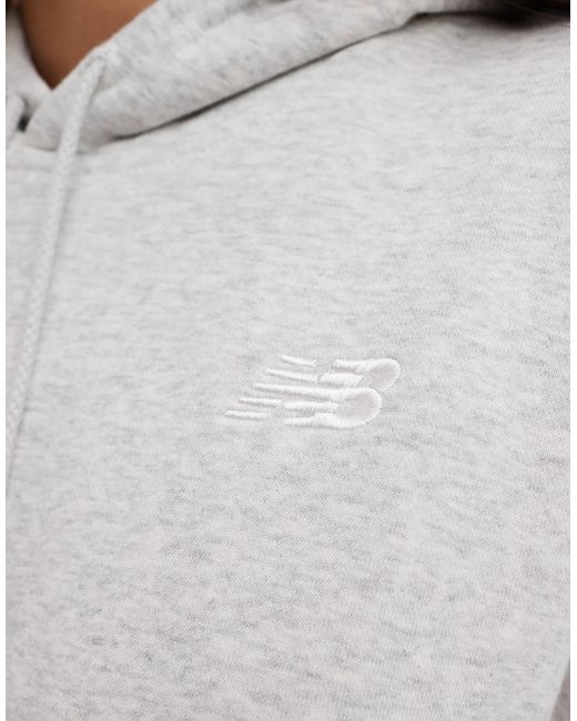 Sport essentials - sweat en tissu éponge New Balance en coloris Gray