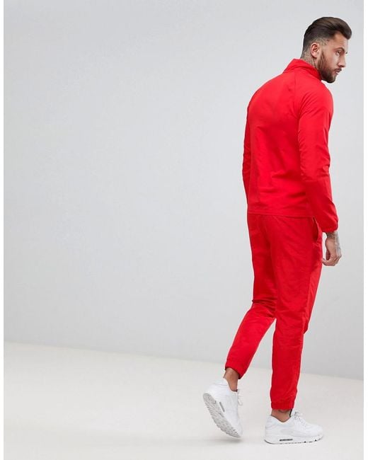 nike red tracksuit top