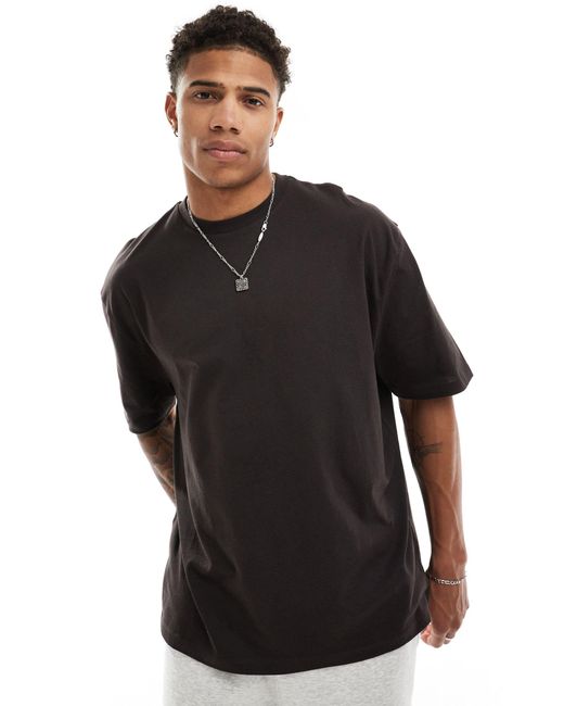 T-shirt oversize à imprimé fleuri au dos ASOS pour homme en coloris Black