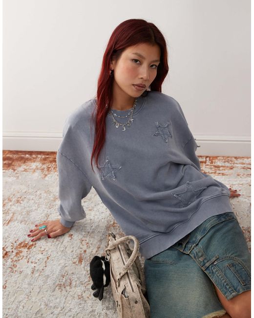 Sweat oversize avec appliqués étoiles - bleu délavé Monki en coloris Gray