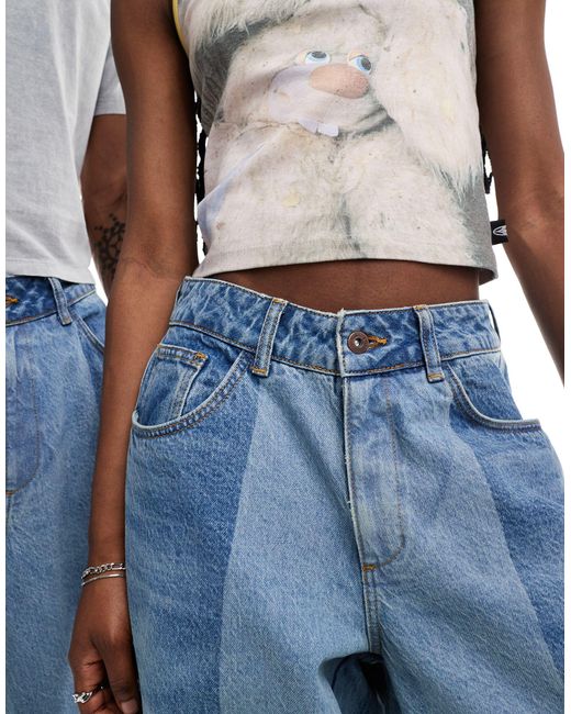 Unisex - jeans a palloncino lavaggio medio patchwork di Collusion in Blue