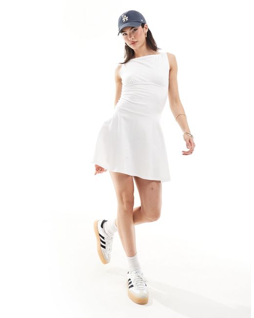 Vestido blanco estilo tenista con bajo caído ASOS de color White