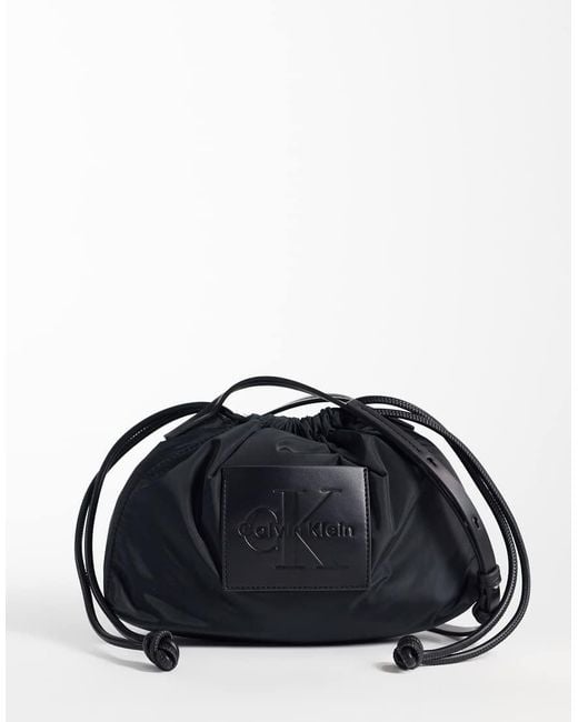 Calvin Klein Blue Nylon Drawstring Crossbody Bag With Bold Logo