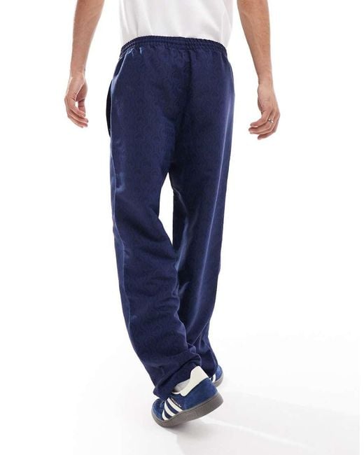 Adidas Originals Blue 70S Club Tracksuit Bottoms for men