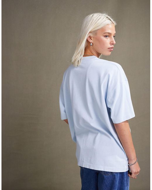 T-shirt oversize unisex oversize slavato con stampa disney di topolino e minnie di ASOS in Blue