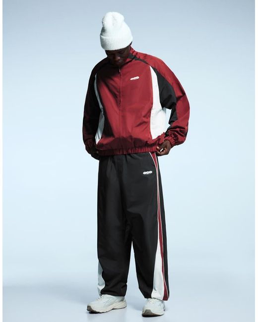 Bershka Black Super baggy Technical Sports Trousers for men