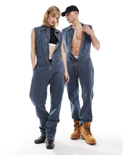 Exclusivité asos - - combinaison en jean sans manches avec fermeture éclair - délavé Calvin Klein en coloris Blue