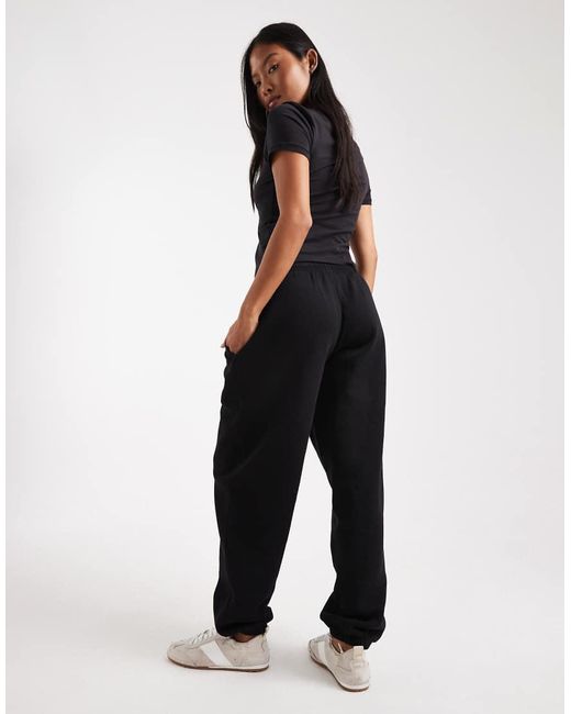 Joggers Negros Con Bajos Ajustados E Interior Afelpado Ultimate De Asos Design Petite ASOS de color Black