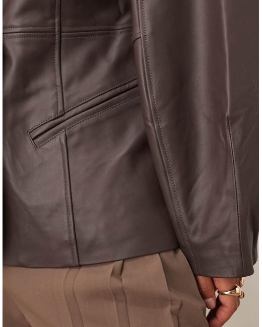 ARRANGE Brown Curve Soft Leather Jacket With Cinched Waist And Ovoid Sleeve