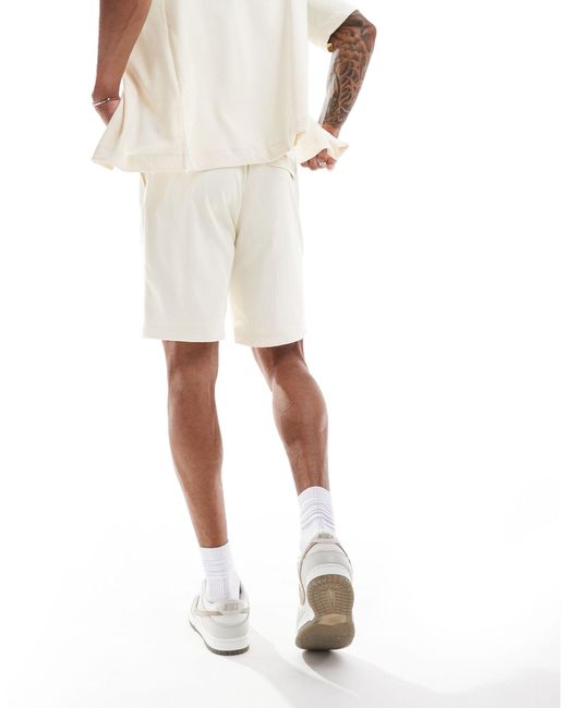 Pantaloncini bianchi a coste testurizzati di The Couture Club in White da Uomo