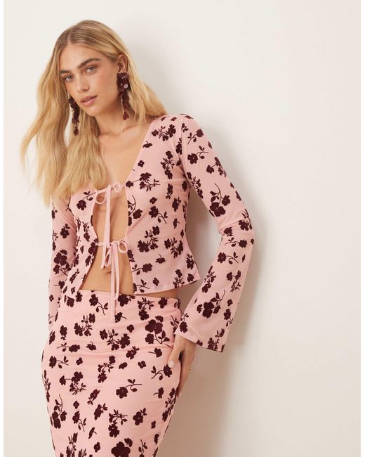 Top d'ensemble transparent noué devant à motif fleuri floqué ASOS en coloris Pink