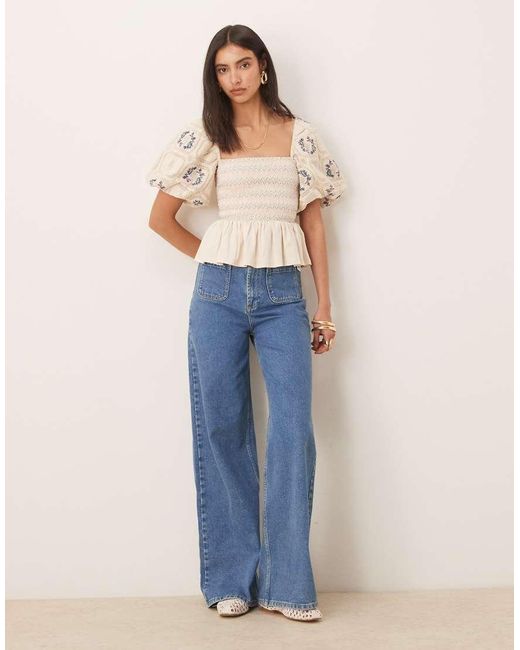 Top Blanco Fruncido Con Sobrefalda En El Bajo Y Mangas Abullonadas De ASOS de color Blue