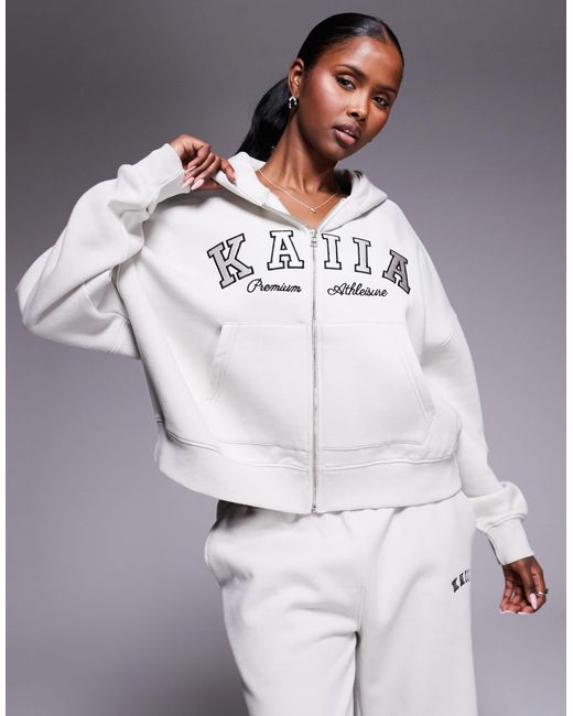 Sweat à capuche d'ensemble en coton majoritaire à fermeture éclair et broderie logo - clair Kaiia en coloris Gray