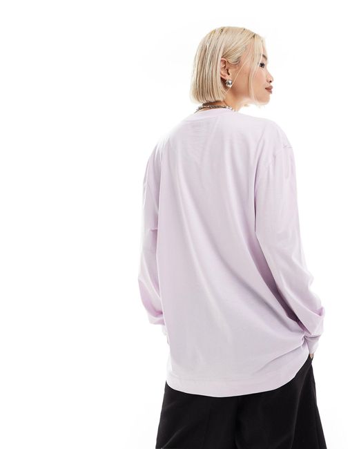 Unisex - t-shirt a maniche lunghe lilla con logo di Collusion in Pink