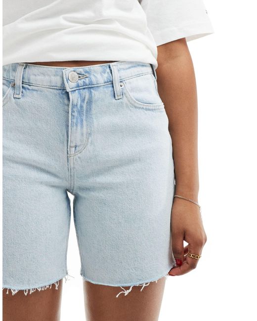 Maddie - pantaloncini di jeans a vita medio alta lavaggio chiaro di Tommy Hilfiger in White