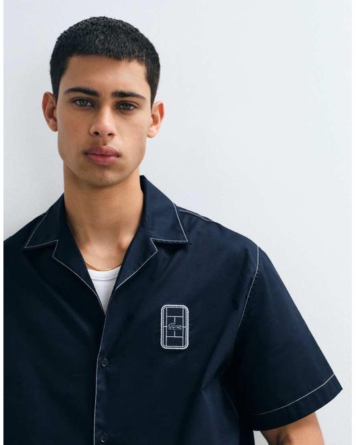 Lacoste Blue Short Sleeve Button Through Logo Polo Shirt for men