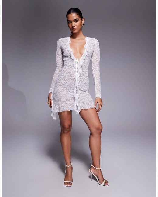 Clarisse - robe courte en dentelle à décolleté plongeant avec volants et liens à nouer I.AM.GIA en coloris Gray
