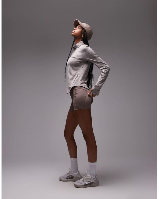 Top De Manga Larga Con Media Cremallera Dri-Fit Swift De Nike de color Gray