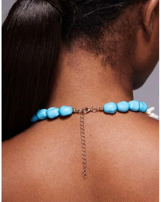 Collar De Cuentas Gruesas Con Flores De Loto De South Beach de color Purple