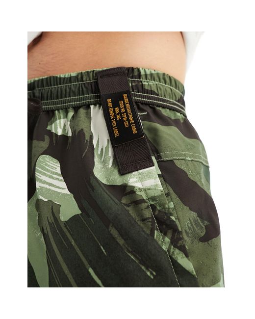 Form - short 9 pouces en tissu dri-fit à imprimé camouflage Nike pour homme en coloris Green