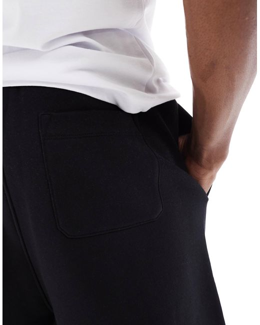 ASOS – essential – oversize-shorts in Black für Herren