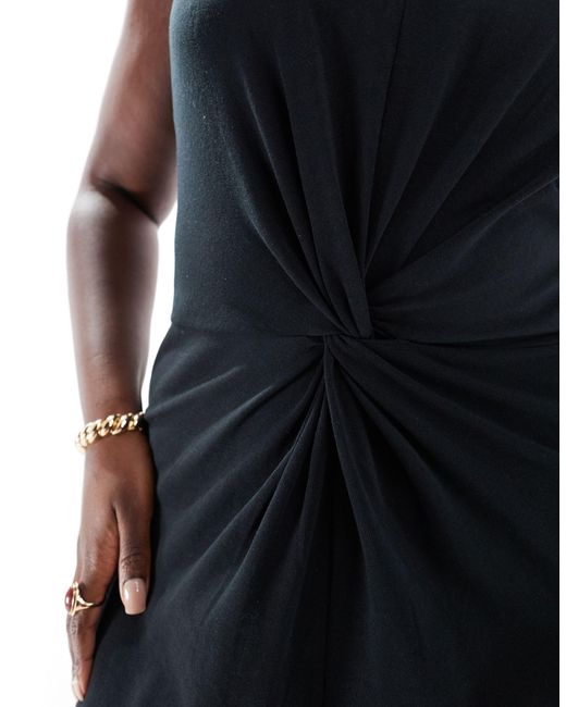 Curve - robe sans manches avec taille cintrée Mango en coloris Black