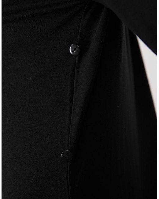 Iyal Black Bamboo Long Sleeve Wrap Cape Detail Top