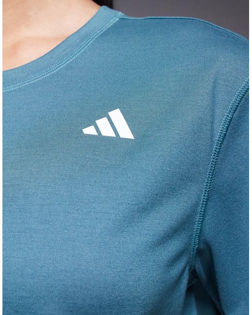 Adidas training - t-shirt crop top coupe carrée - sarcelle Adidas Originals en coloris Blue