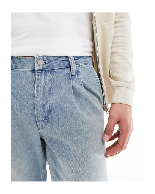 Jeans classici rigidi medio con pieghe e risvolto di ASOS in Blue da Uomo