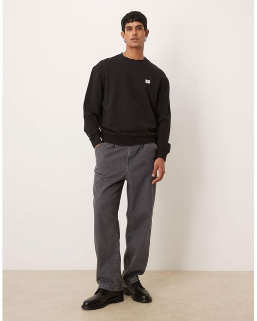 Calvin Klein Black Small Badge Logo Sweatshirt for men