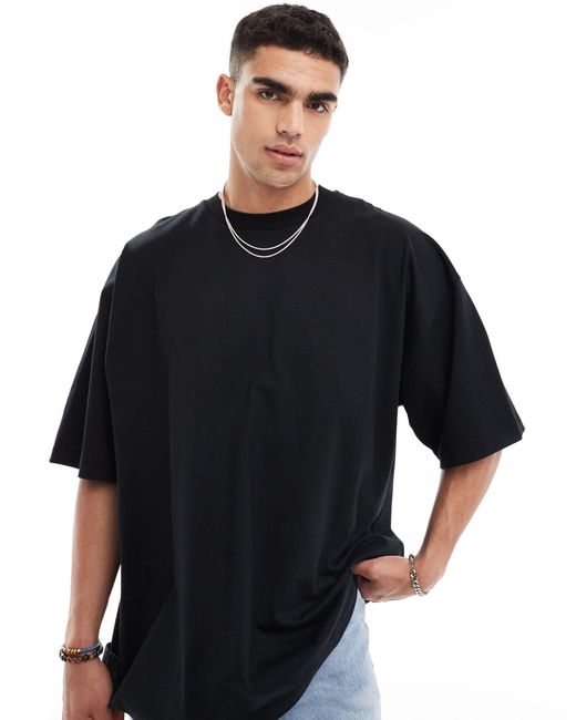 Camiseta negra extragrande con estampado grunge ASOS de hombre de color Black