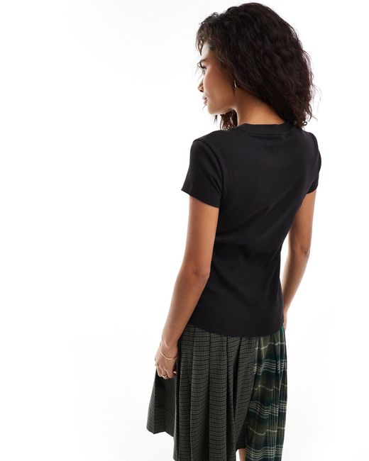 PUMA Black – classics – schmal geschnittenes, geripptes t-shirt
