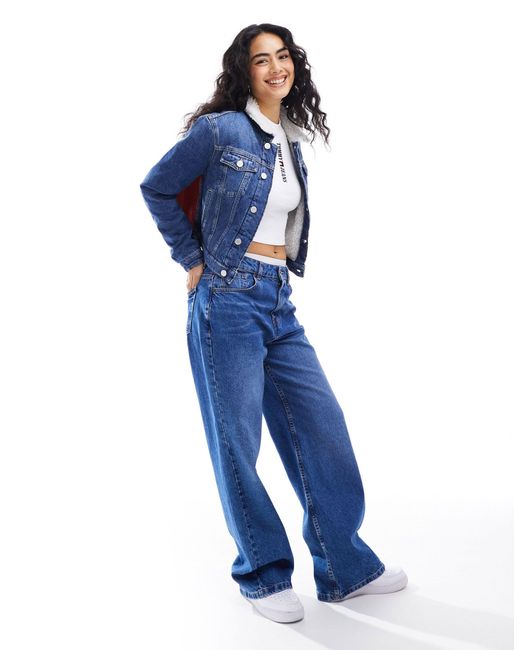 Izzie - veste en jean ajustée avec logo drapeau et détails en imitation peau Tommy Hilfiger en coloris Blue