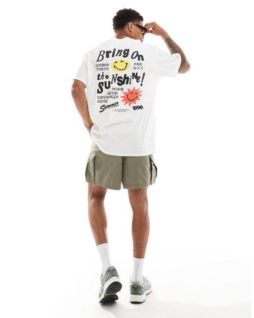 T-shirt oversize bianca con stampa "smile sunshine" sul retro di ASOS in White da Uomo