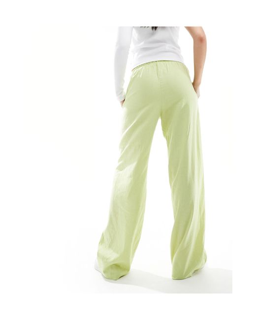 Pantalon large en lin noué à la taille - pistache Bershka en coloris White