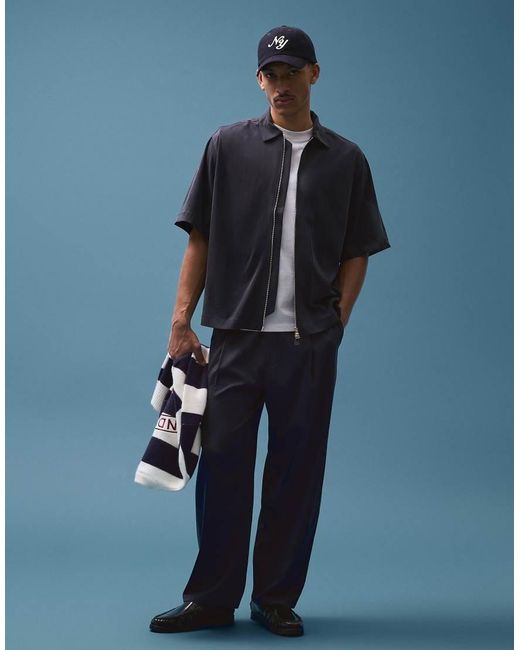 Bershka Blue Fluid Super baggy Darted Trousers for men