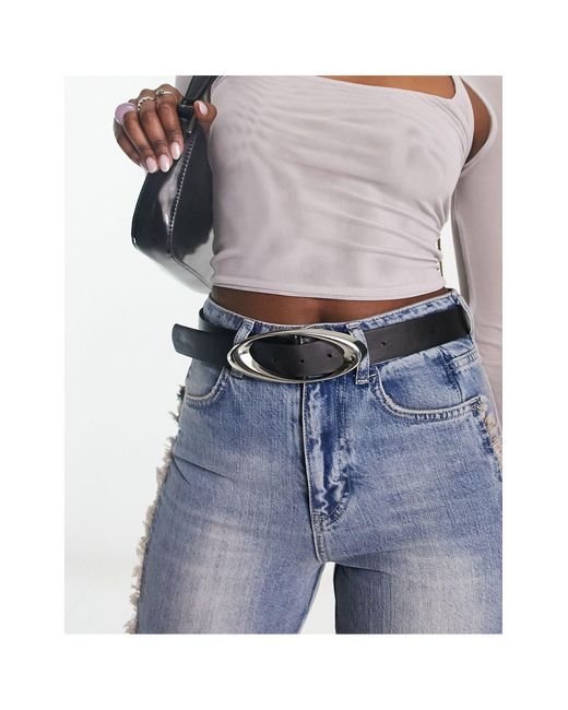 Cintura da jeans per vita e fianchi nera con fibbia ovale di ASOS in Neutro  | Lyst